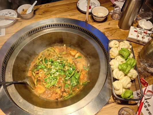山河屯铁锅炖订餐电话-第1张图片